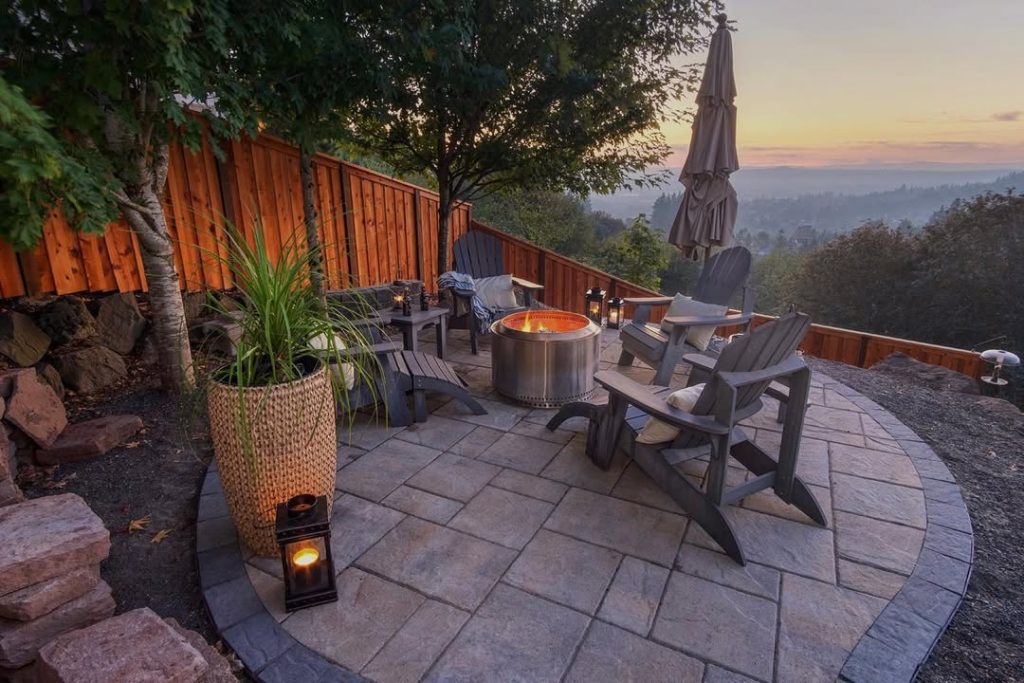 Sunset patio with fire pit Adirondack chairs and mountain views