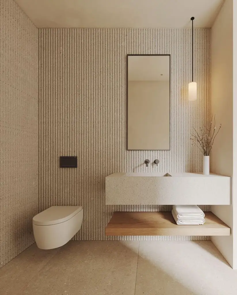 Minimalist bathroom with ribbed walls floating vanity and wooden accents