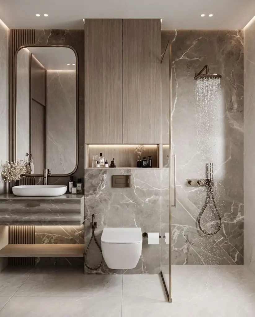 Contemporary bathroom with marble walls floating vanity and curved mirror