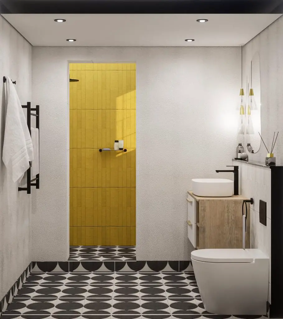 Modern bathroom with yellow door black and white geometric tiles and floating vanity