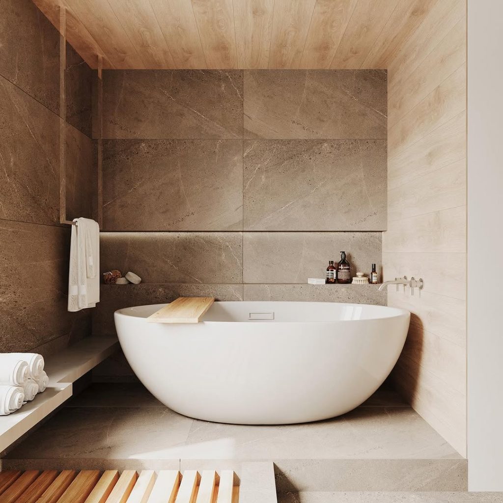Minimalist bathroom with freestanding tub concrete walls and wooden accents