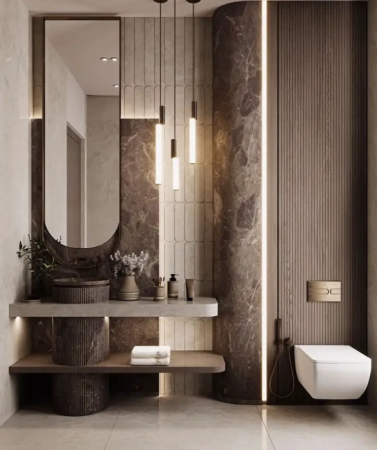  Modern powder room with hanging lights curved vanity and textured walls
