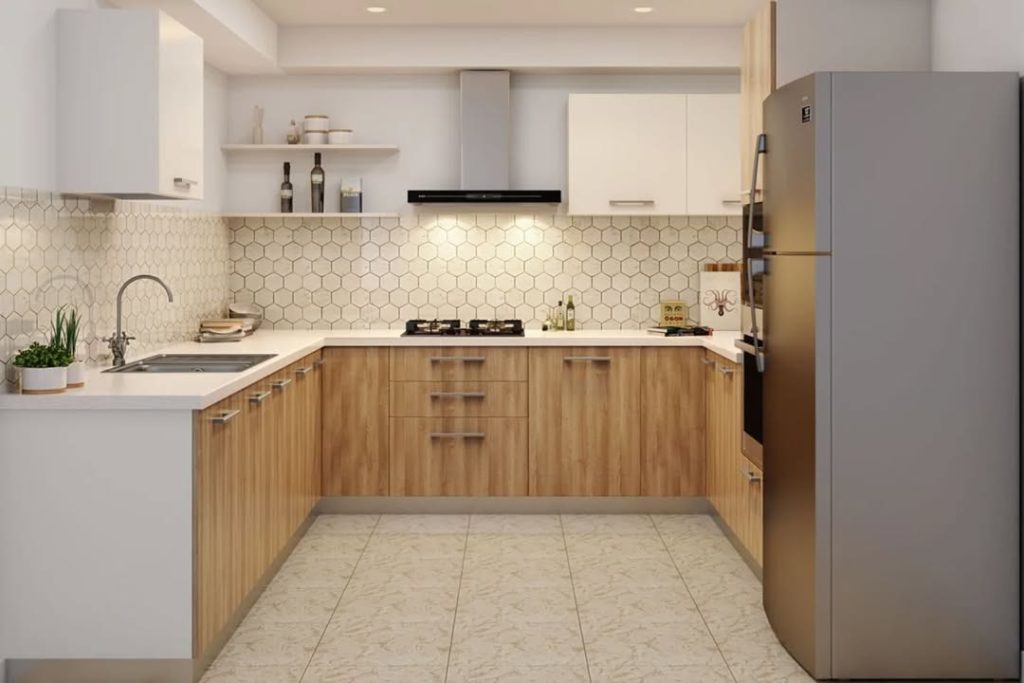 Compact U-shaped kitchen with wood cabinets, hexagonal tile backsplash, stainless appliances