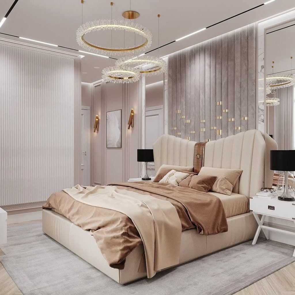 Elegant bedroom with crystal chandeliers and textured wall panels