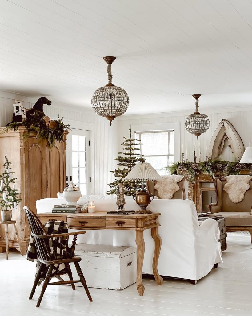 White cottage living room crystal chandeliers holiday decorations