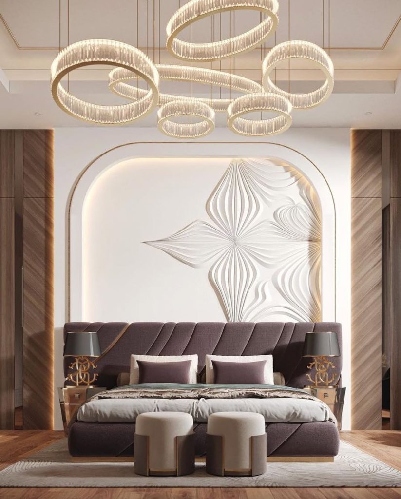 Elegant bedroom with curved lighting and relief wall pattern