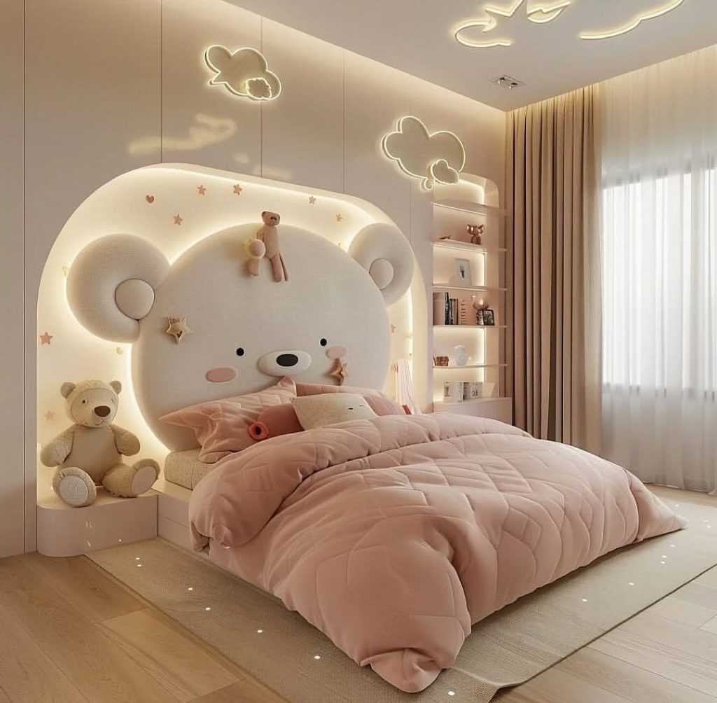 Pink kids bedroom with illuminated bear headboard and cloud lighting