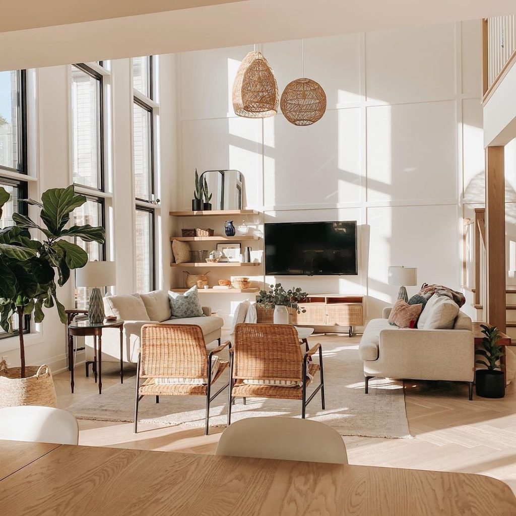 Neutral living room with woven pendant lights and natural textures