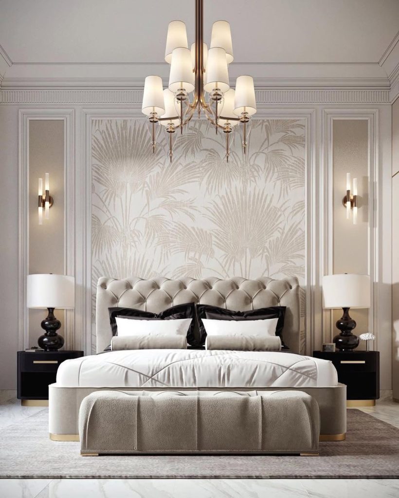 Traditional bedroom with palm wallpaper and crystal chandelier