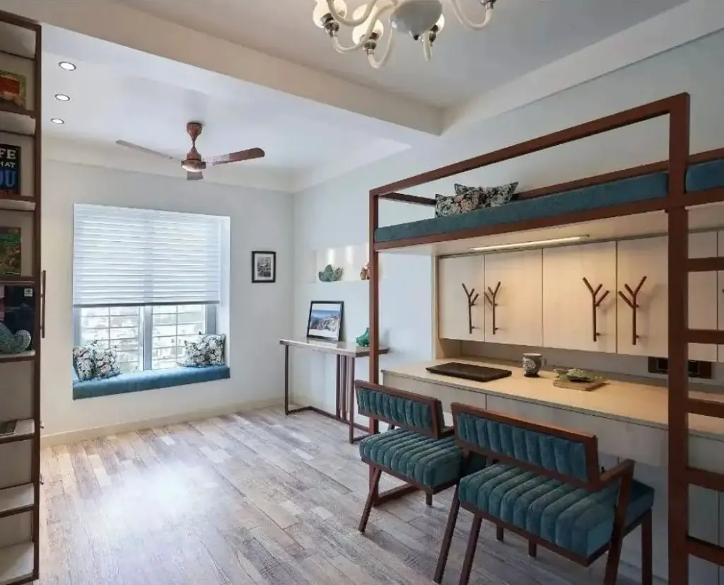 Bunk bed room with built-in desk and seating