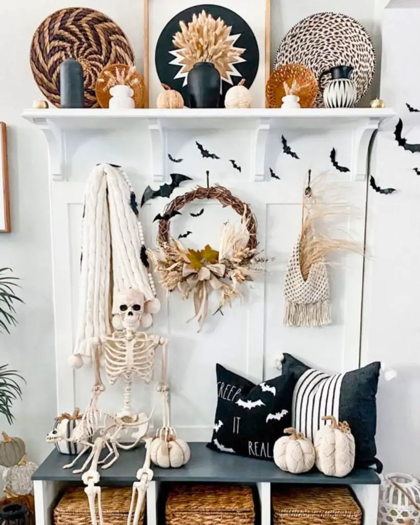 Boho style shelving unit decorated with skeletons pumpkins and natural textures