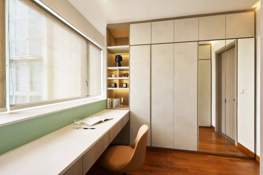 Minimalist study with sage accents and floating desk