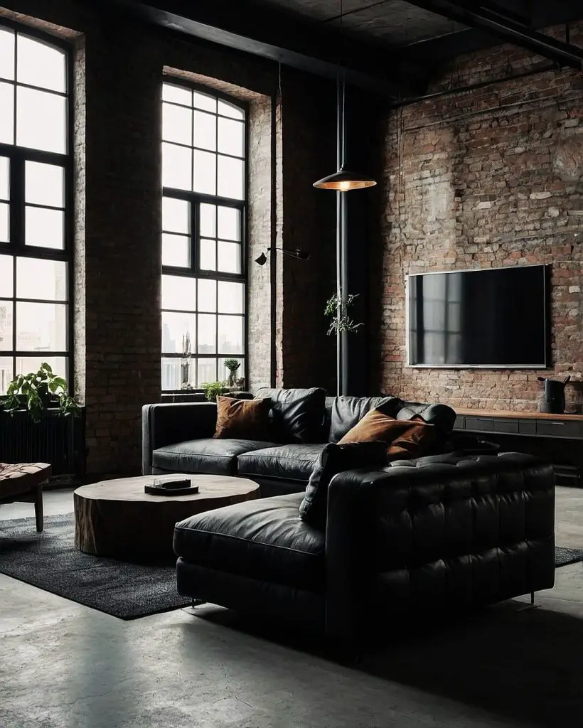 Factory conversion loft with weathered brick and copper lighting