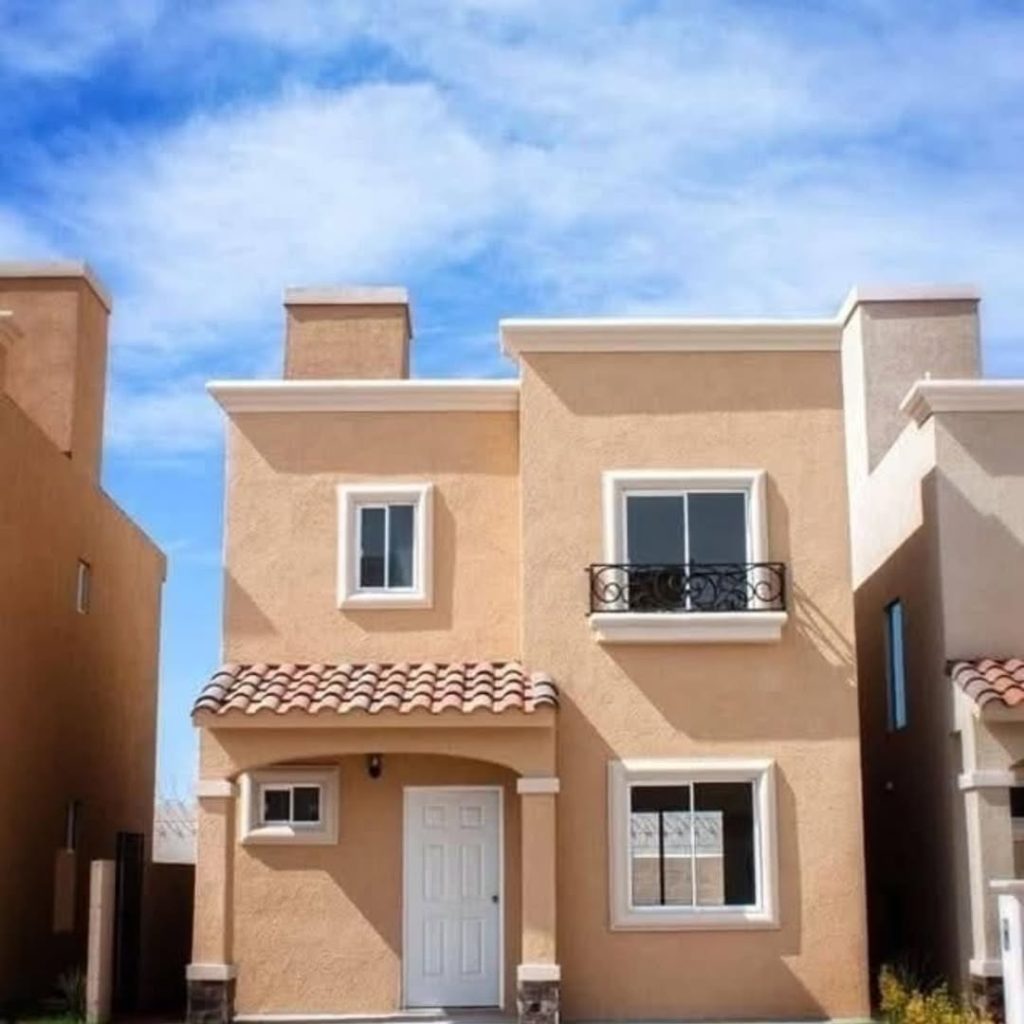 Beige contemporary house with iron balcony clay roof