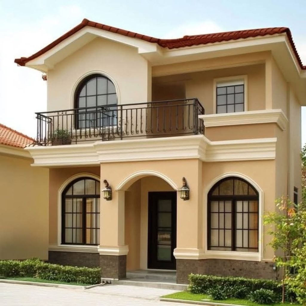Beige Mediterranean house with arched entrance balcony