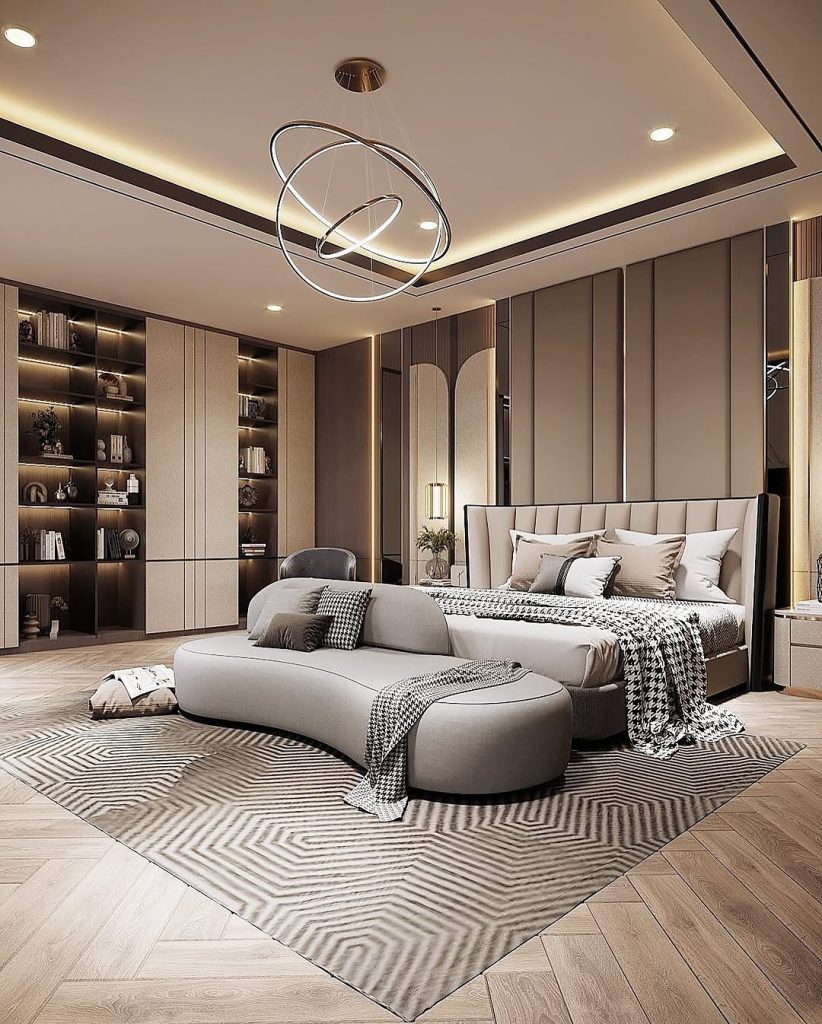 Contemporary bedroom with geometric rug and orbital pendant lighting