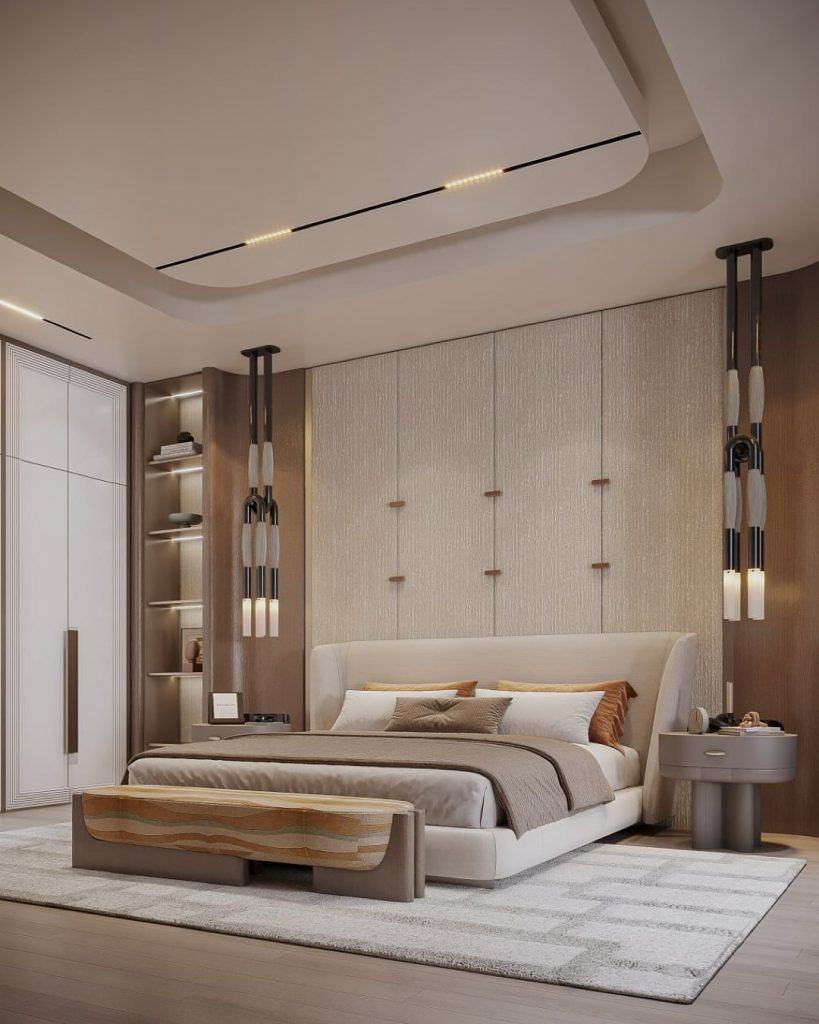 Clean bedroom with linear pendant lights and textured headboard