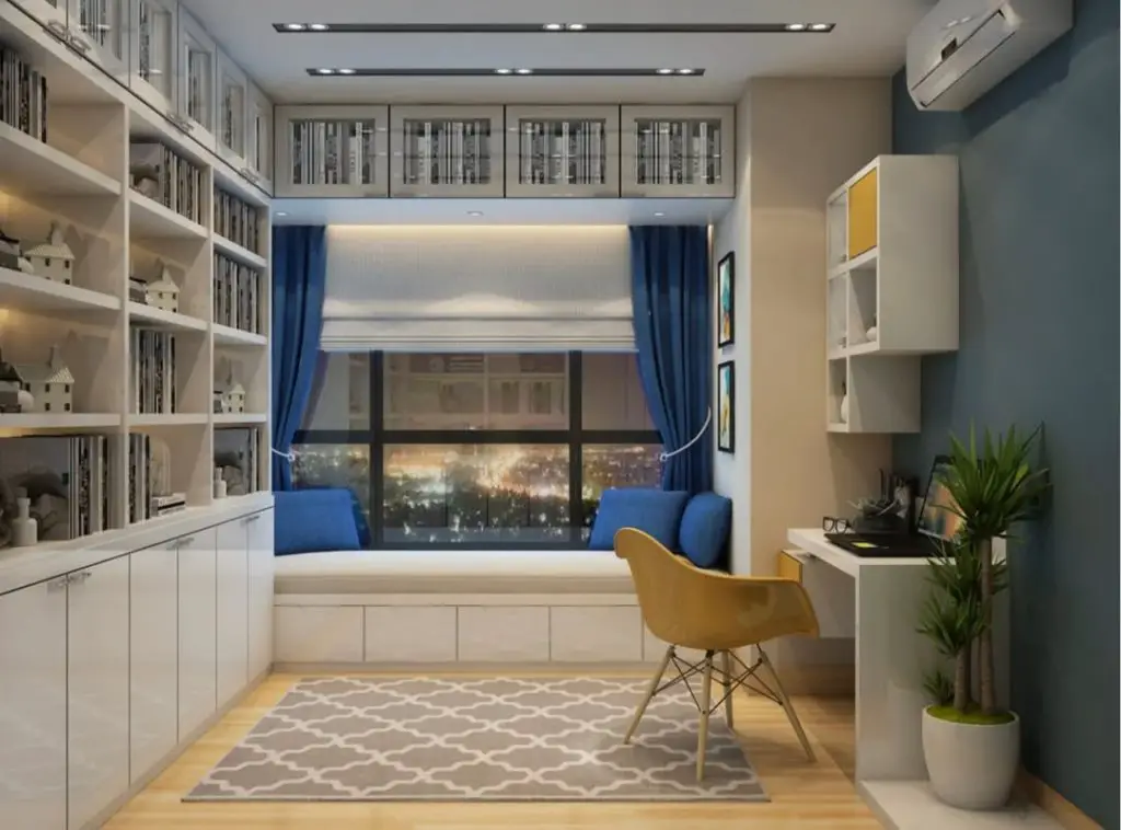 Library room with extensive white shelving and window seat