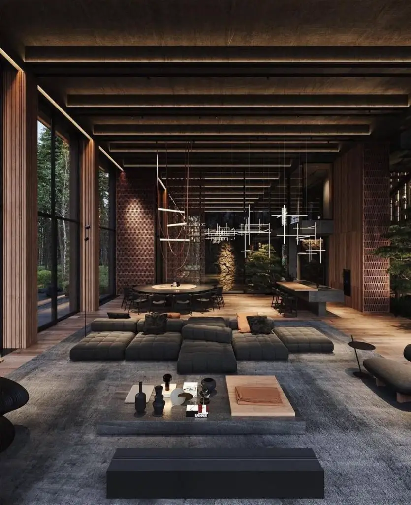 Forest retreat pavilion with exposed timber beams and modular seating