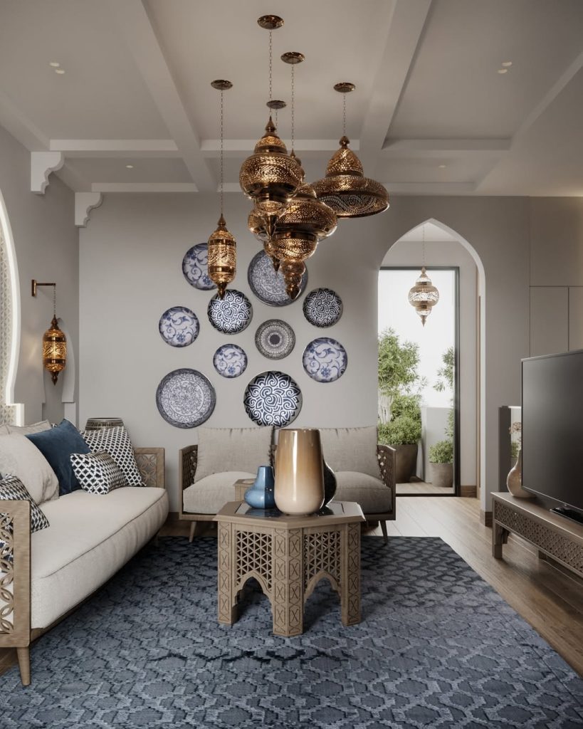 Neutral sectional with Moroccan pendant lights and decorative plate wall display
