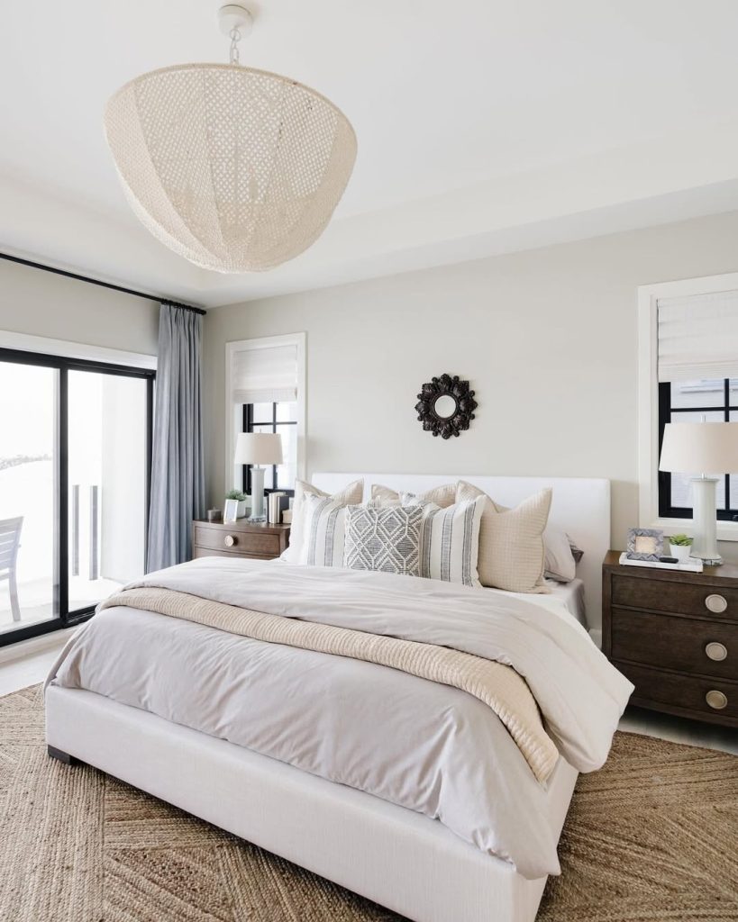 Coastal bedroom with woven pendant light and natural textures