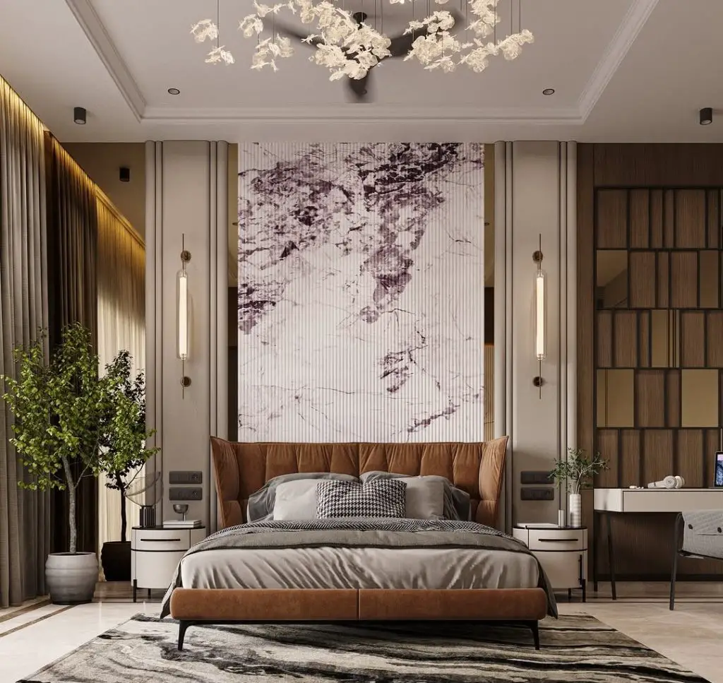 Bedroom with branch chandelier textured walls organic materials