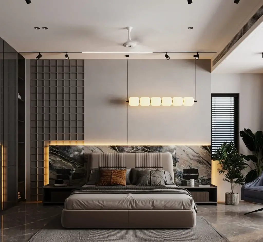 Bedroom with grid paneling linear pendant lighting marble headboard