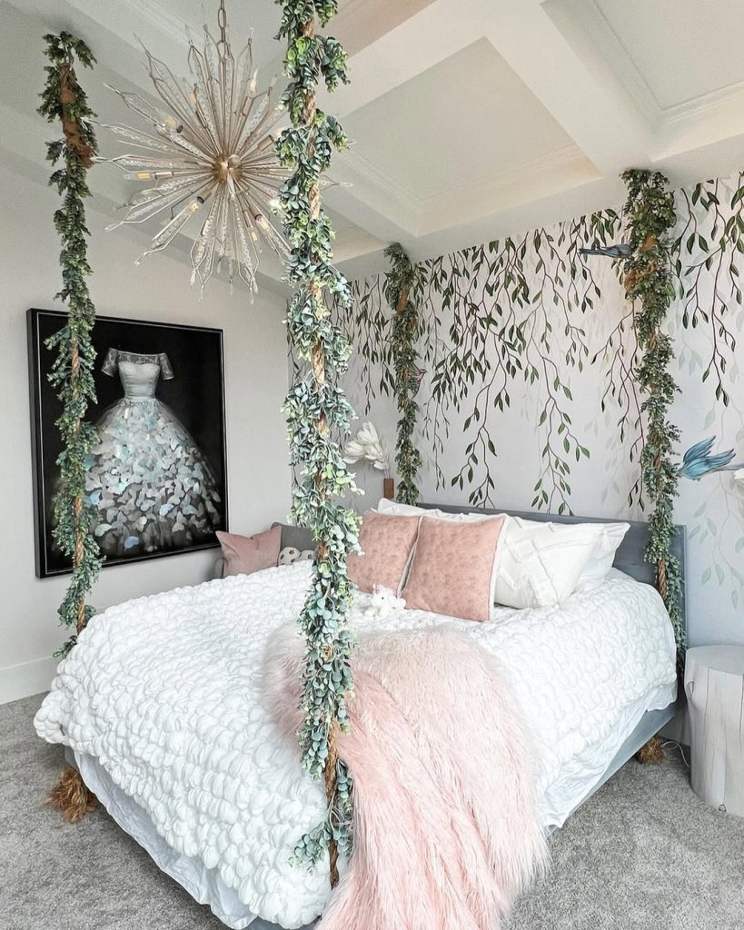 Nature-inspired bedroom with hanging plants and botanical wallpaper accents