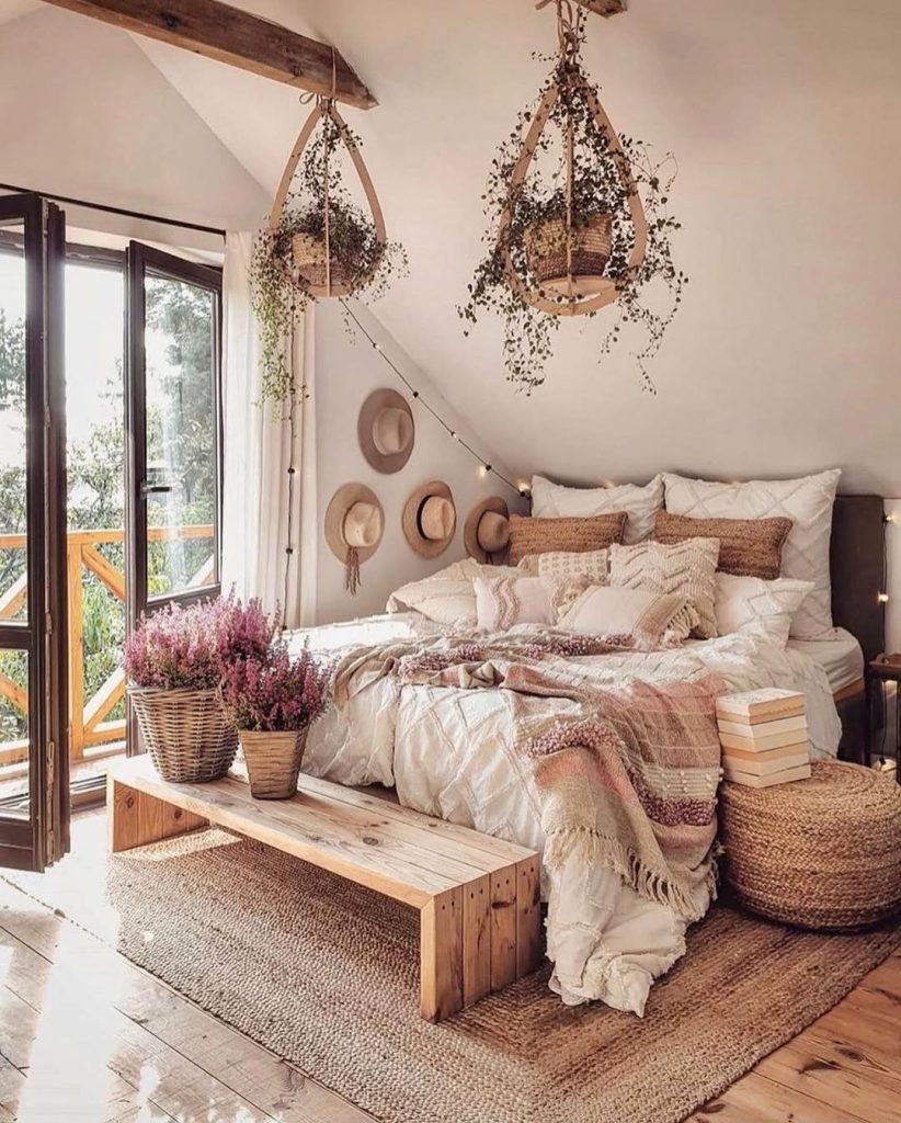 Rustic modern bedroom with exposed beams and hanging planters