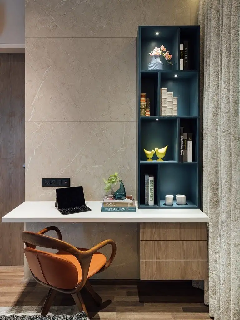 Modern desk with illuminated teal display shelving