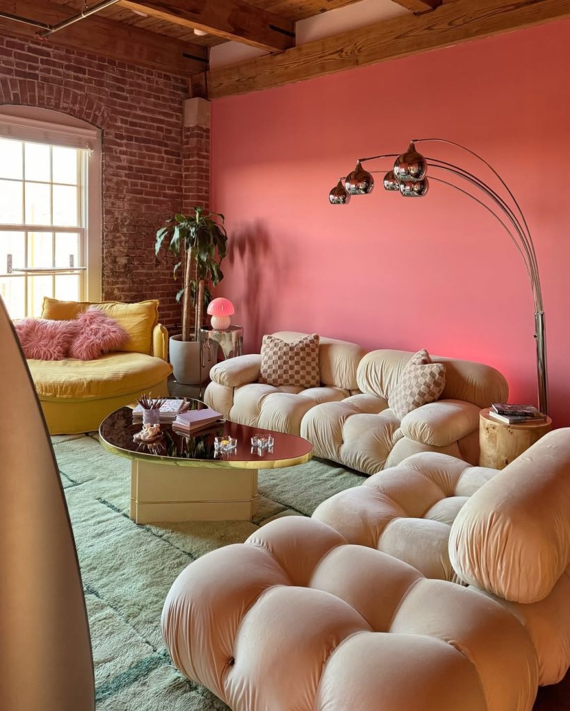 Textured living room with exposed brick and chrome lighting