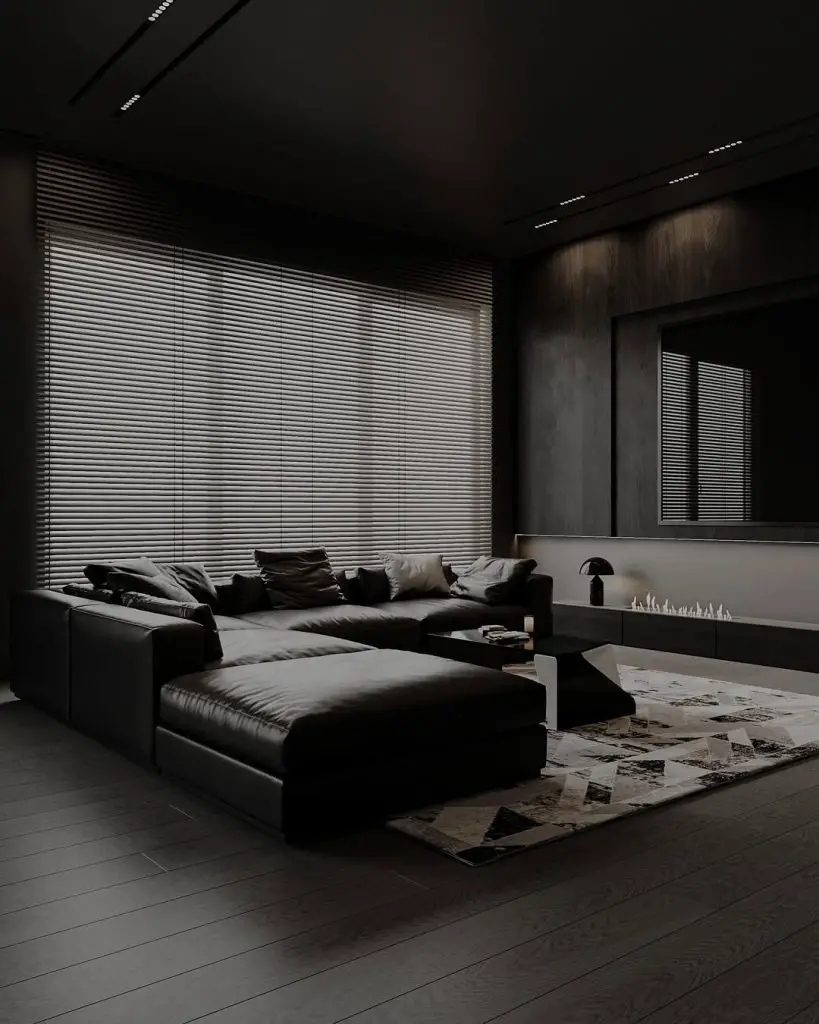 Dark sophisticated living room with charcoal walls and metallic accents
