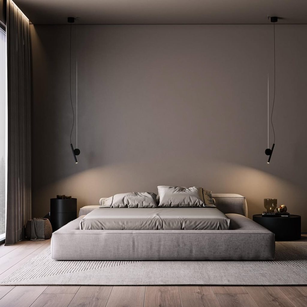 Modern minimalist bedroom with platform bed and pendant lighting