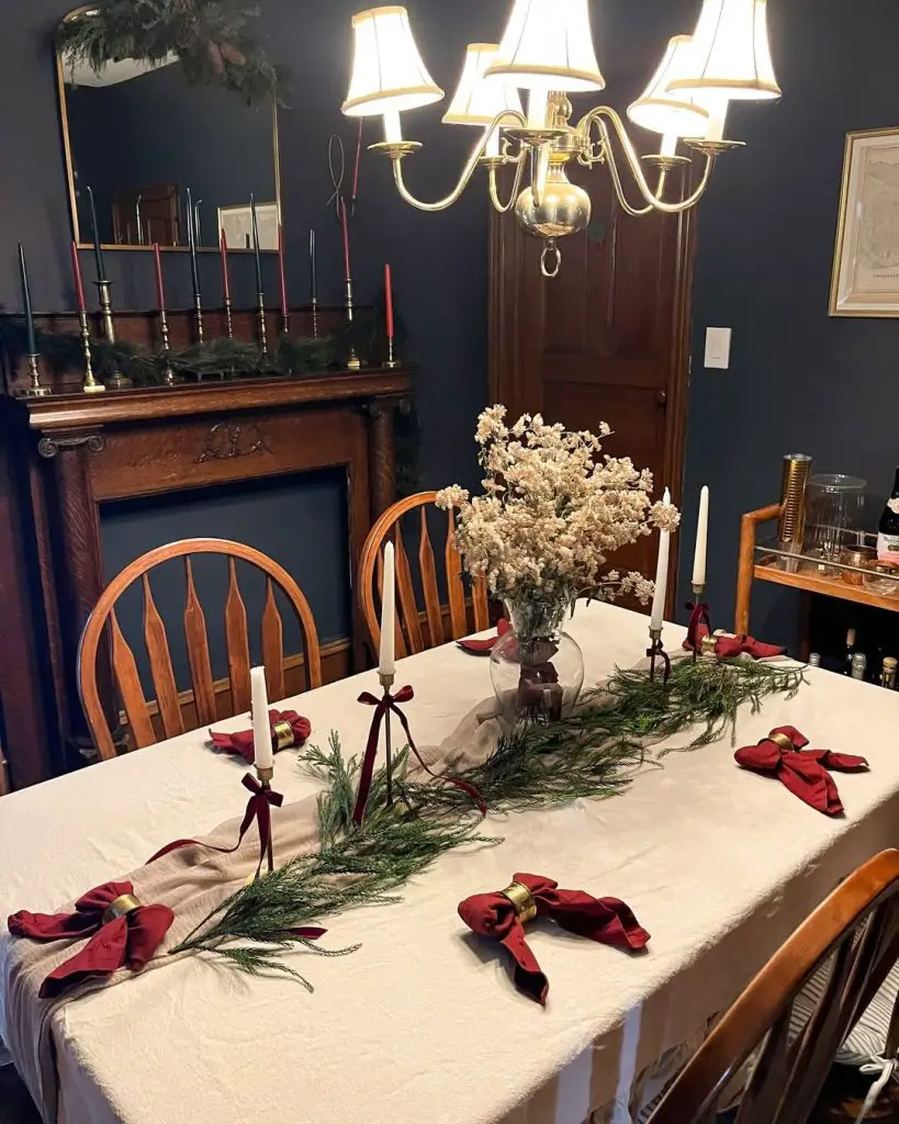 Elegant dining room with Christmas table setting and candles