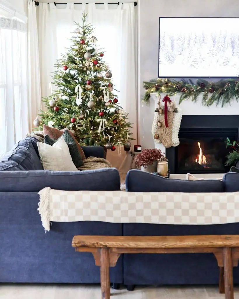 Traditional living room with Christmas tree and cozy seating