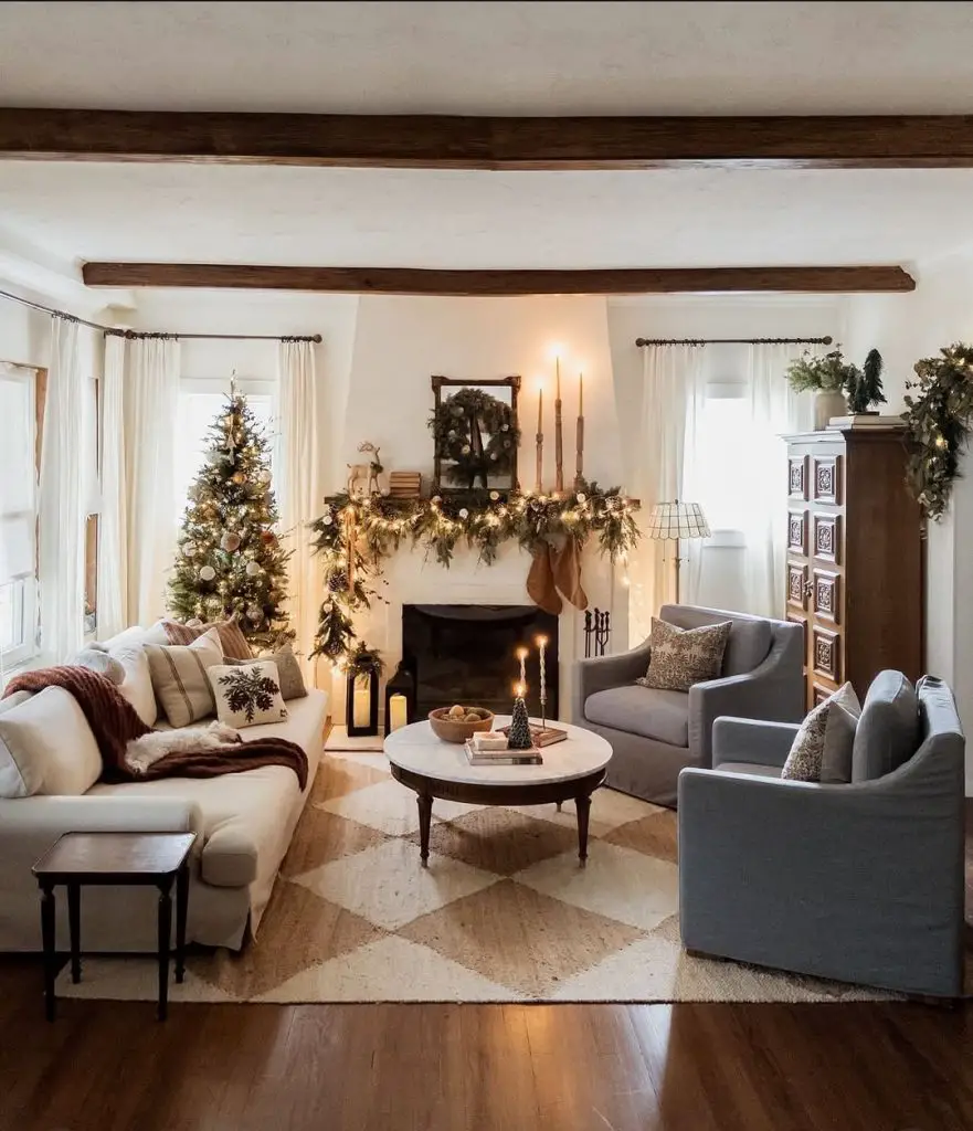 Elegant living room with green accents Christmas tree and neutral furniture