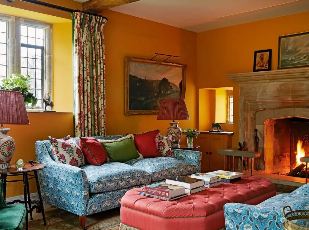 Traditional living room with tall bookshelves and mixed seating