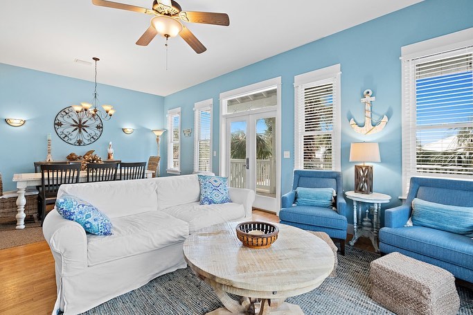 Blue living room with sectional sofa and coastal decor