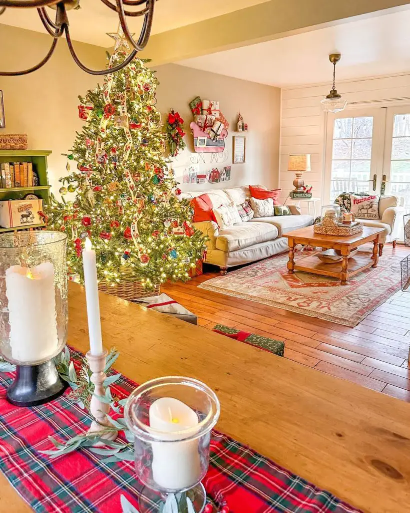 Cozy country living room with vintage Christmas decorations and plaid accents