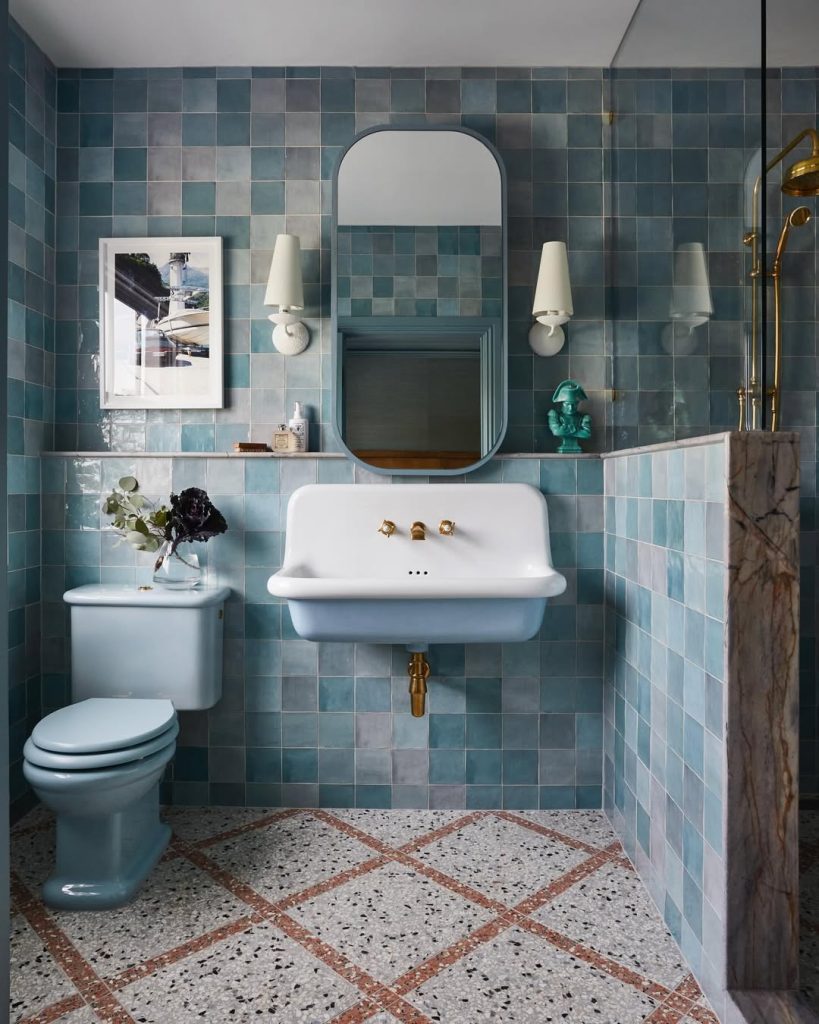 Small bathroom featuring blue checkered tiles and modern fixtures