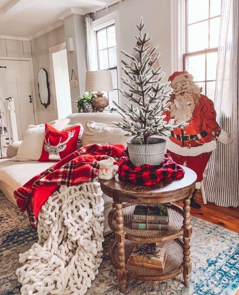 Christmas coffee table with plaid blanket small tree