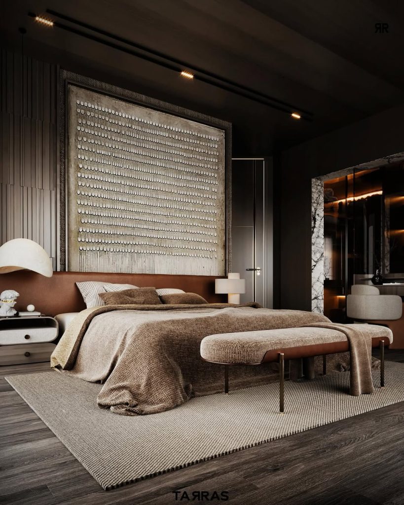 Bedroom with textured headboard wall and neutral bedding
