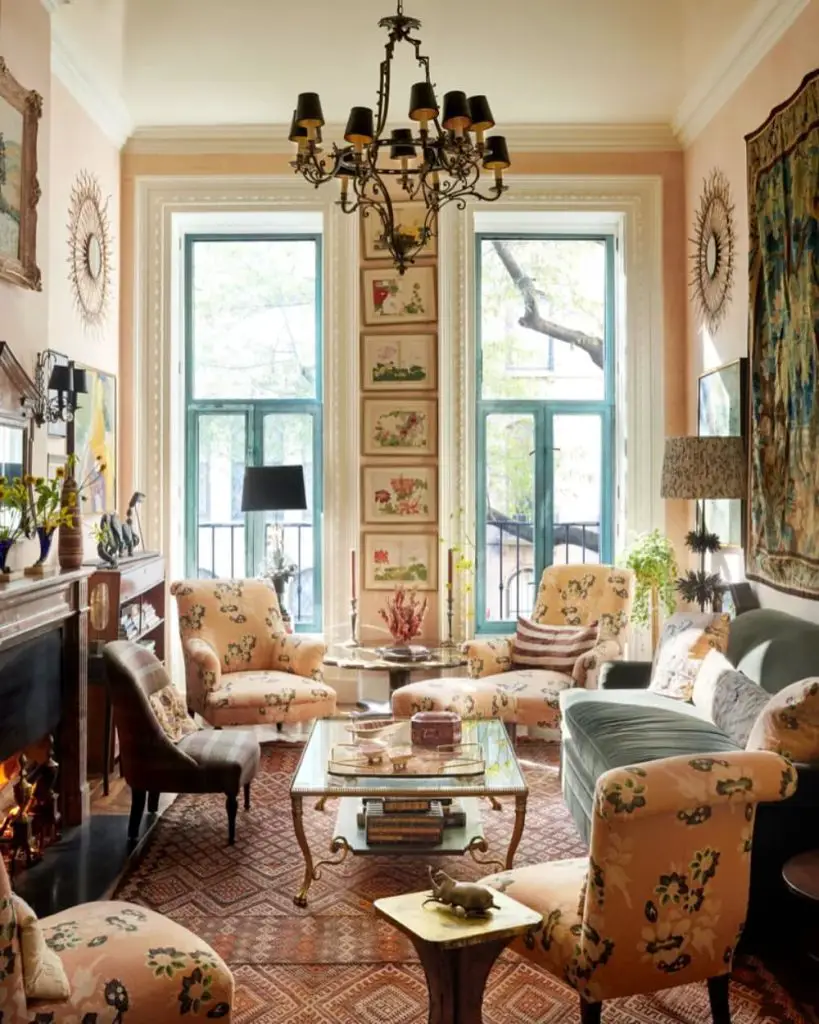 Cozy living room with floral chairs and botanical wall art
