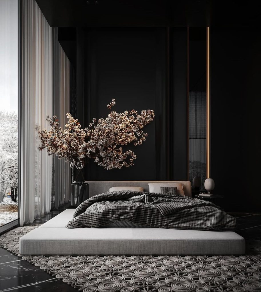 Black bedroom with platform bed and large windows