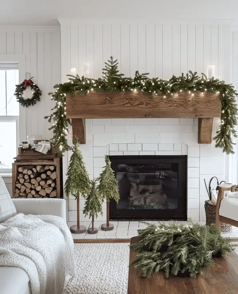 Farmhouse Christmas mantel with garland string lights
