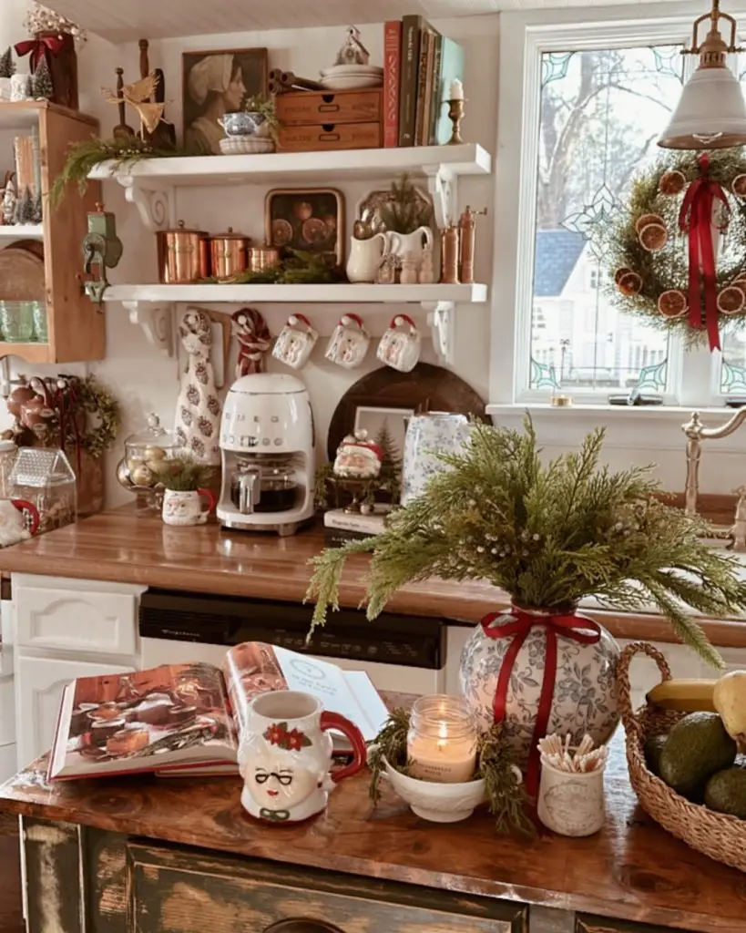 Cozy farmhouse kitchen with Christmas decorations and copper accents.