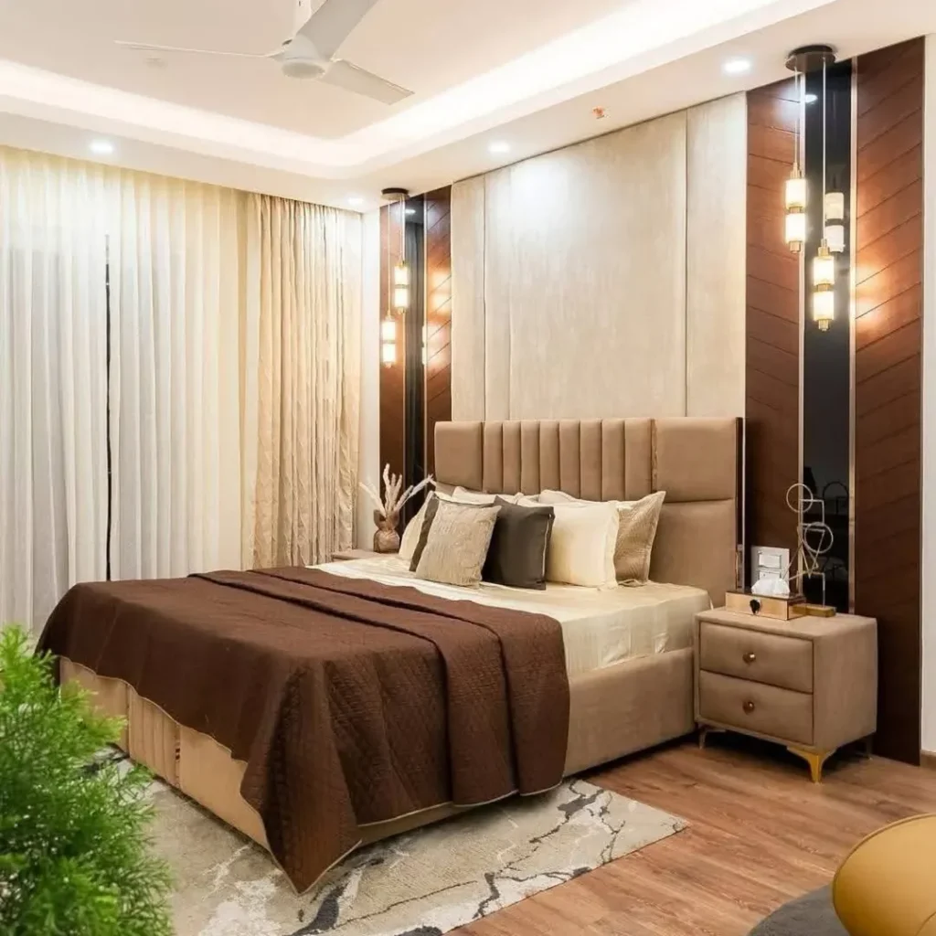Bedroom with wood paneling and multiple pendant lights