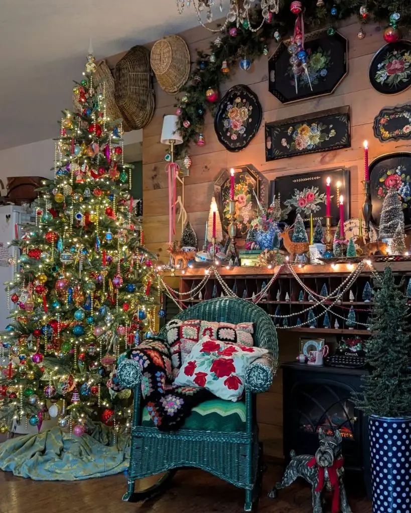 Richly decorated Christmas room with vintage ornaments and wicker chair.
