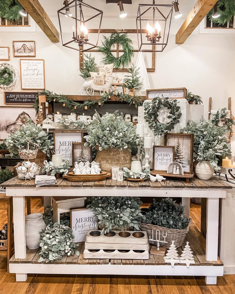  Two-level table with eucalyptus garland Christmas decorations signs