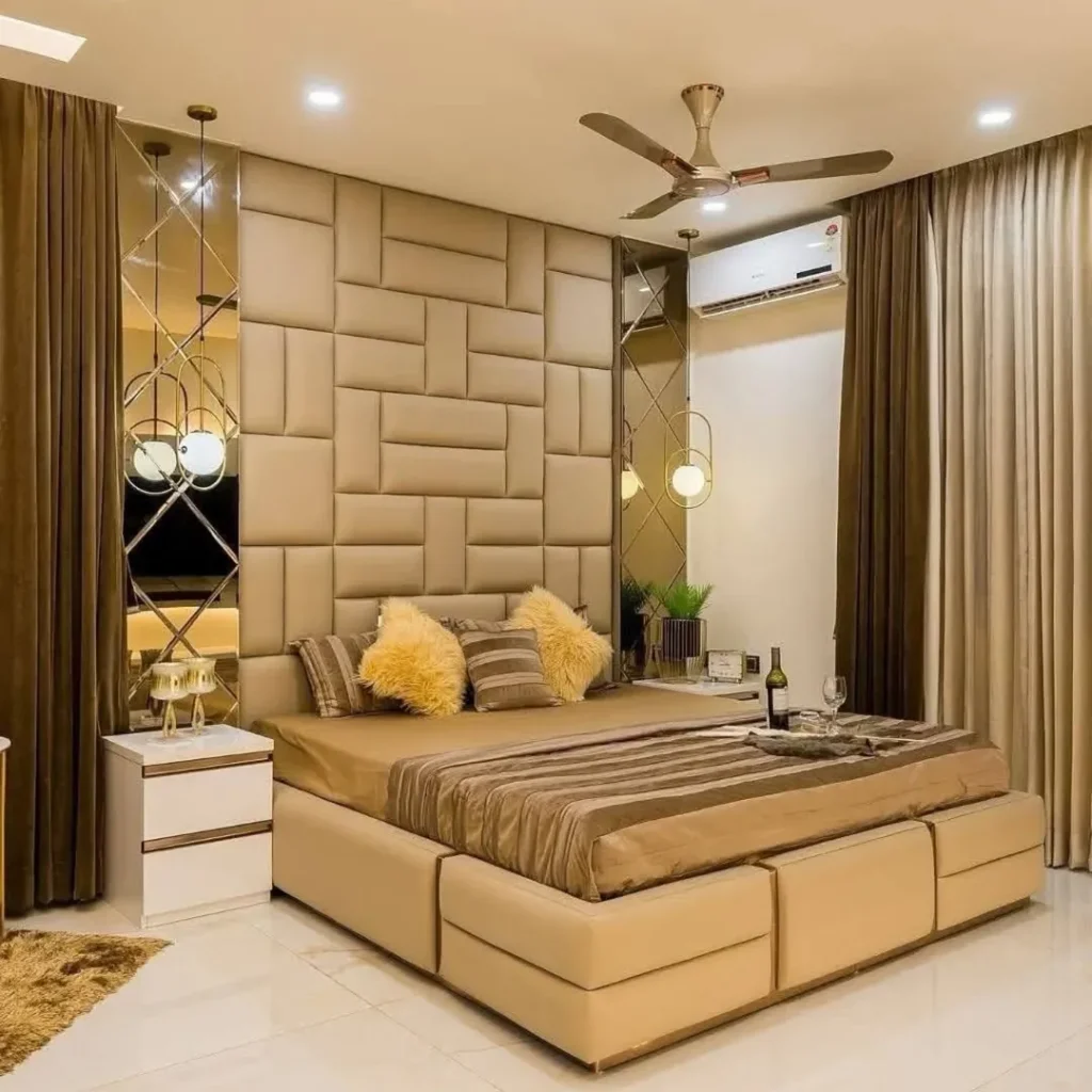Luxury bedroom with quilted headboard and mirror panels